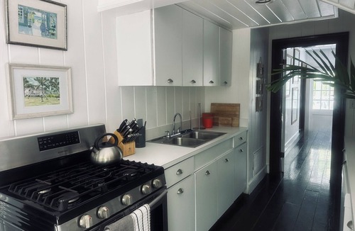 Dunmore Town House | Elegant Garden Oasis, Private Path to Harbour Island's Legendary Pink Sands