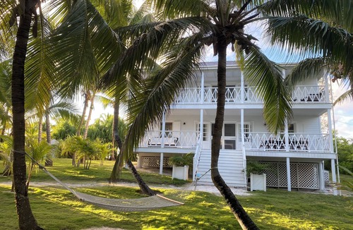 Dunmore Town House | Elegant Garden Oasis, Private Path to Harbour Island's Legendary Pink Sands
