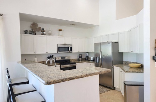 Alice Town House | Exclusive Bimini Bay Home with private boat slip