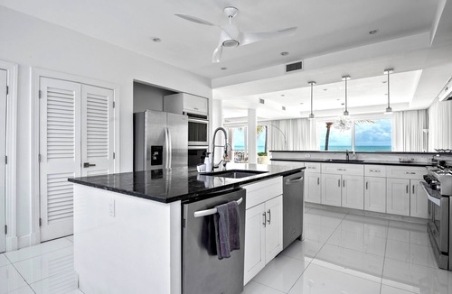 Palm Cay Villa | Exclusive Luxury Beachfront Villa - Private White Sand Beach, Upscale amenities.