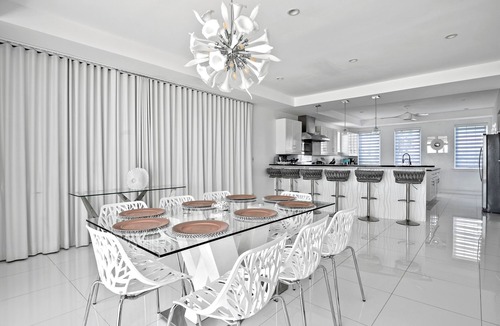 Palm Cay Villa | Exclusive Luxury Beachfront Villa - Private White Sand Beach, Upscale amenities.