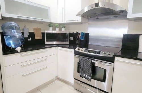 Bahamia West Condo | Gated condo w/boat dock/beach/pool/hot tub