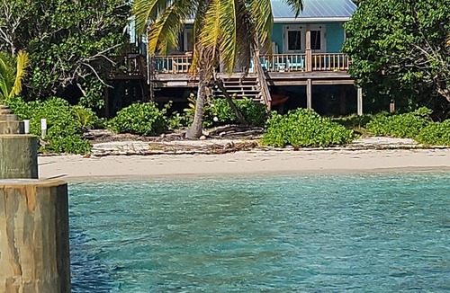 Lubbers Quarters Cay House | Green Bananas Cottage with sandy beach and private dock. Completely rebuilt.