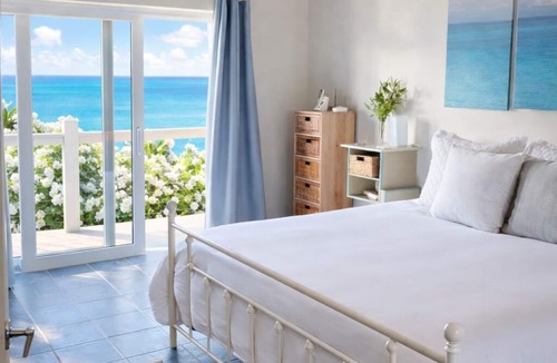 Salt Pond House | Grotto Bay: 5BR Villa w/Private Beach