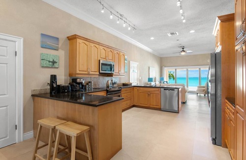 Rokers Point House | Hart House, vast patio with hot tub, heated pool & outdoor bar on Flamingo Bay