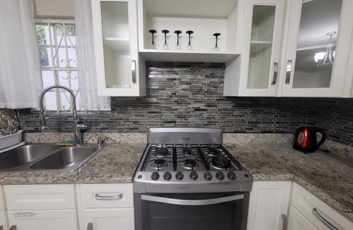 Nassau House | HILLSIDE GATED PRIVATE HOME WITH FULL SIZED SWIMMING POOL