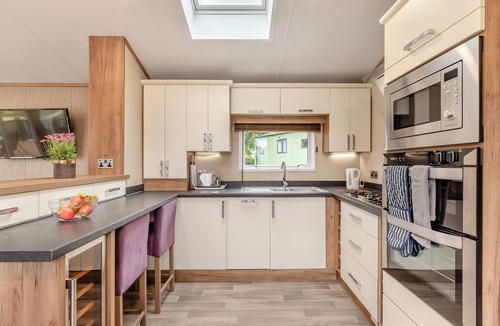 Axminster House | Holiday Home with one double and two twin bedrooms.