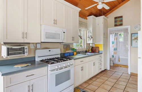 Gregory Town Villa | Home overlooking Gregory Town's famous Cove. Beach chairs and SUP included