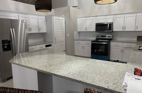 Treasure Cay House | Home with Beautiful View sleeps 7, Private Pool, Tiki and 50 ft Dock/Generator