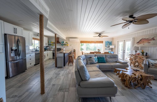 Treasure Cay House | Key Lime House with a 100’ dock: A Solar-Powered Waterfront Oasis on Black Sound