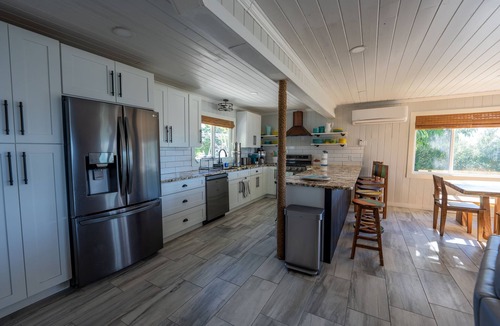 Treasure Cay House | Key Lime House with a 100’ dock: A Solar-Powered Waterfront Oasis on Black Sound