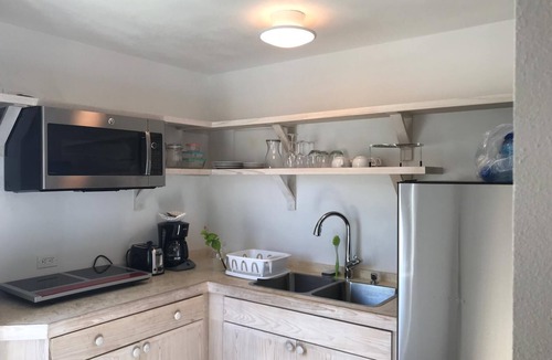 North Palmetto Point Cottage | La Bougainvillea Boutique Hotel - Private cottage