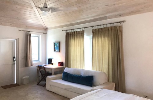 North Palmetto Point Cottage | La Bougainvillea Boutique Hotel - Private cottage