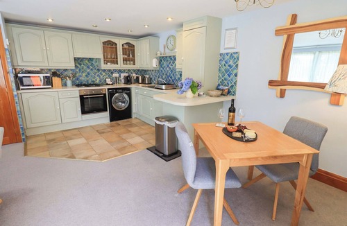 Brockhole Cottage | LAKESIDE COTTAGE, with a garden in Troutbeck Bridge