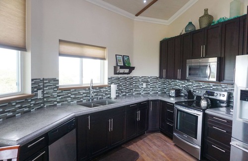 Staniel Cay Villa | Layin' Low includes one golf cart/villa with water views