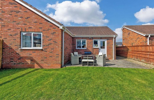 Beadnell Cottage | Lovely modern bungalow only minutes from the sand dunes at Beadnell Bay.