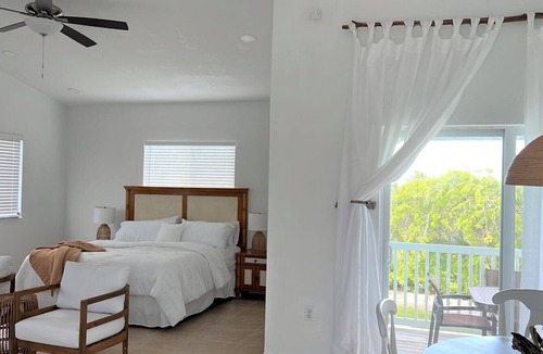 Alice Town Condo | Lovely Studio steps from the beach. Optional golf car rent