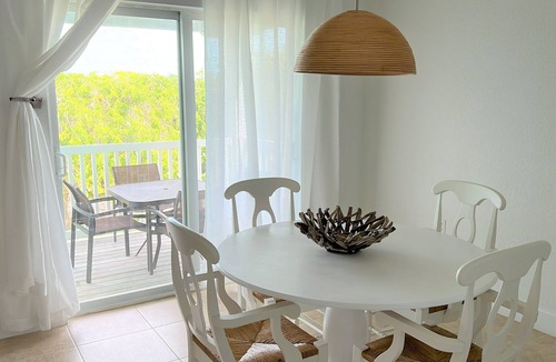 Alice Town Condo | Lovely Studio steps from the beach. Optional golf car rent