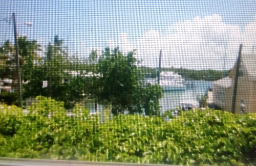 Man O War Cay Cottage | Loyalist cottage, cathedral ceilings, generator, air con, use of dock 23' max