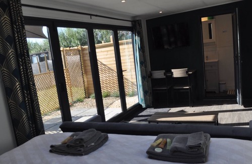 Chackmore Ski Chalet | Luxurious Pavillion with Skylight, Patio, and Quadruple garden door and ensuite