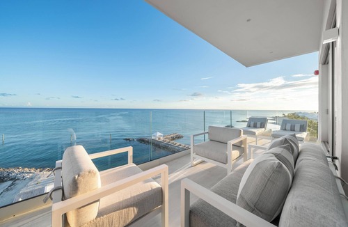 Palm Cay Condo | Luxurious Sea Wind Condo – Oceanfront Elegance with Private Beach Access