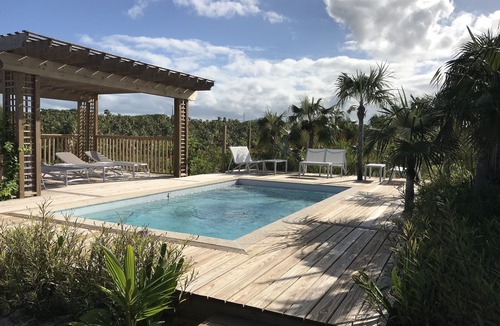 North Palmetto Point House | Luxury Beach House with Pool in Boutique Resort