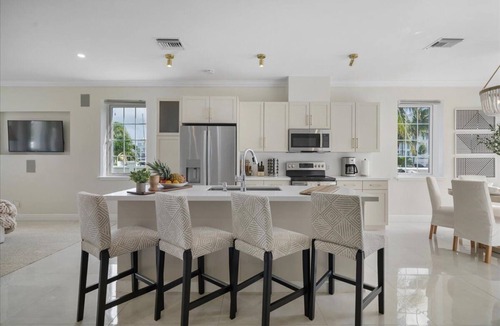 Nassau House | Luxury Beach side escape, steps from private beach, restaurant, marina, and café
