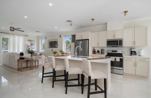 Nassau House | Luxury Beach side escape, steps from private beach, restaurant, marina, and café