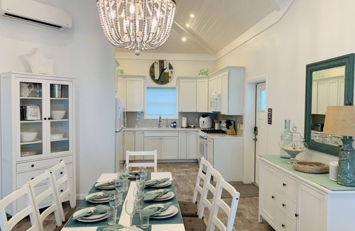 Lubbers Quarters Cay House | Luxury oceanfront 4BR · 2 protected docks · private gated compound
