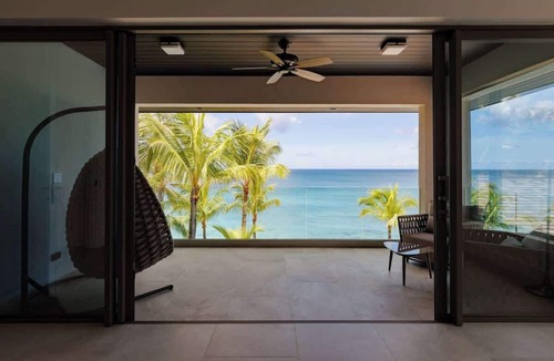 Westwind House | Luxury Oceanfront Villa with Private Beach & Pool