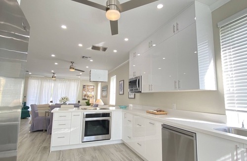 Palm Cay House | Luxury townhouse in gated community steps away from the beach and pool