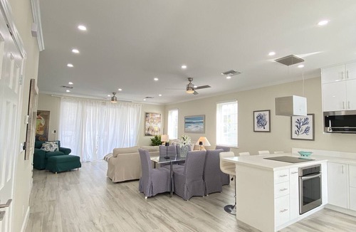 Palm Cay House | Luxury townhouse in gated community steps away from the beach and pool