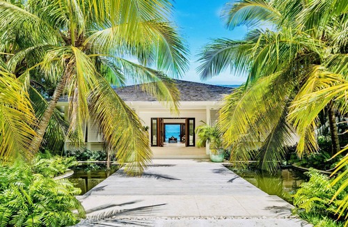 Dunmore Town Villa | Luxury Waterfront Estate, Dock, Chef Gazebo Pool House, Boat and Captain