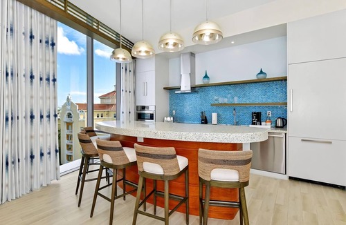 Downtown Nassau Apartment | Margaritaville Waterpark Three Bedroom Residence with Kitchen and Balcony.