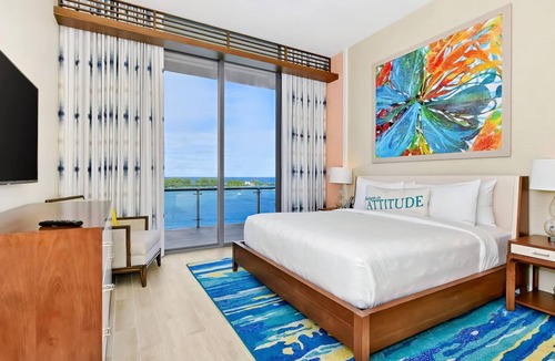 Downtown Nassau Apartment | Margaritaville Waterpark Three Bedroom Residence with Kitchen and Balcony.