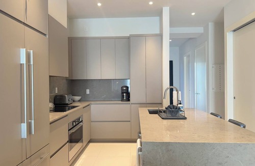 Westwind Apartment | Modern 2-bedroom apartment in Love Beach. Gated Community, beach and gym access