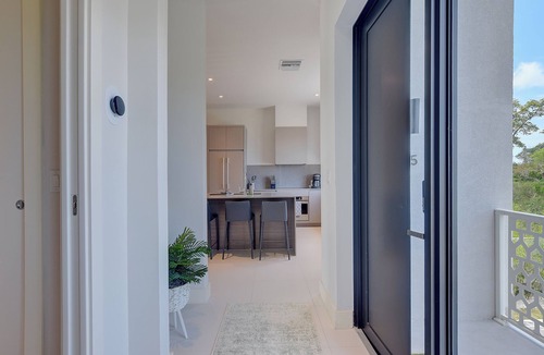 Westwind Apartment | Modern condo in gated community. Steps to beach.