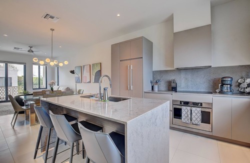 Westwind Apartment | Modern condo in gated community. Steps to beach.