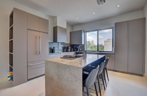Westwind Apartment | Modern condo in gated community. Steps to beach.