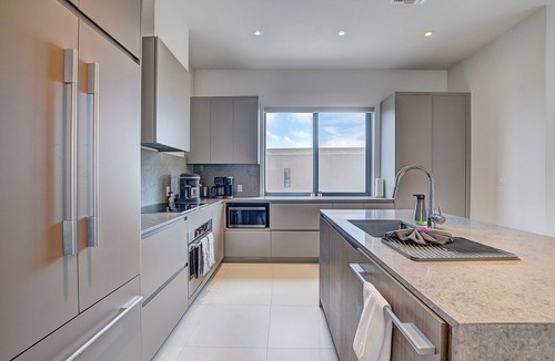Westwind Condo | Modern condo, steps to beach. Gym, generator, gated community.