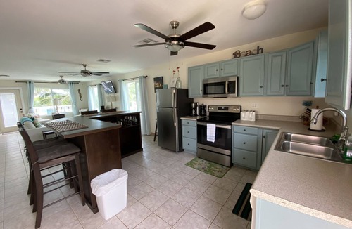 Farmer's Hill House | Modern vacation home with private yard, steps to the beach and centrally located