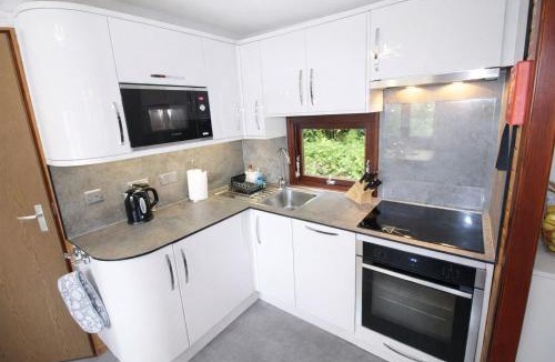 Skelwith Bridge House | Neaum Crag Lodge ideal for a couple or family with young children in a woodland setting at Skelwith Bridge