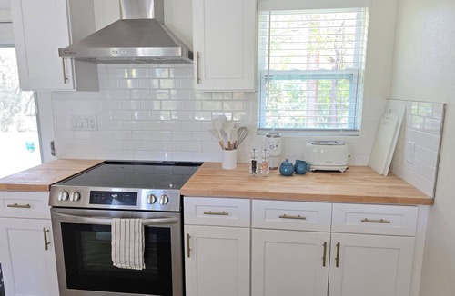 Great Exuma Villa | NEW 2 bdrm Sunset Villa on 1+ acre tropical garden directly on Hoopers Beach