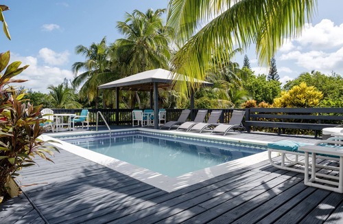 North Palmetto Point House | Newly Remodeled Beachfront Estate w/Pool, Hot Tub, Views, Walk to Rest./Bar