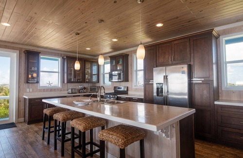Hope Town House | Oceanfront Beauty 6 KING beds/6 baths! Big Pool and Volleyball Court In Front yd