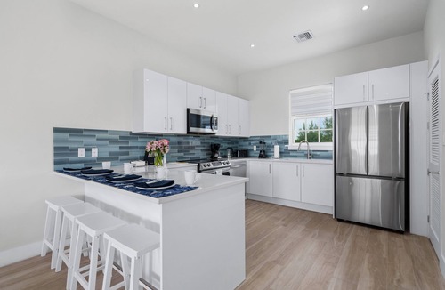 Nassau Villa | Orchid Villa, a Luxury four bedroom villa overlooking the pool in Palm Cay