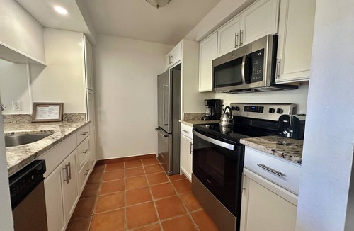 Williams Town Condo | Palm Tree Cove - Stunning Partial Ocean Views; Beachfront Location!