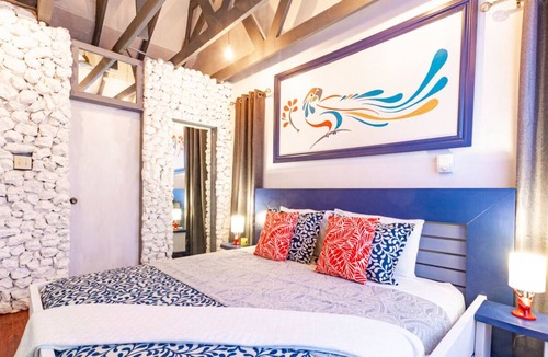 Nassau Cottage | Parrot Cottage at Love Beach Pool