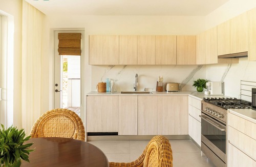 Dunmore Town House | Private Pool Villa at Coral Sands Steps to Pink Sand Beach & Resort Amenities
