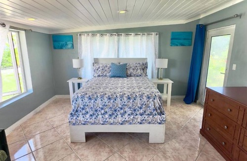 Rolle Town Cabin | Queen Room with Garden View